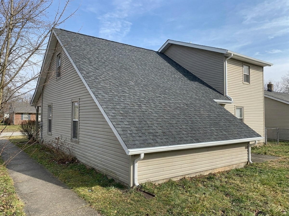 New charcoal architectural shingle roof after replacement